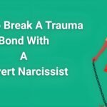 Person breaking free from invisible chains representing how to break a trauma bond with a covert narcissist