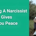 Person sitting peacefully in nature after leaving a narcissist, representing the freedom and tranquility that comes from escaping toxic relationships