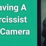 Person safely documenting narcissistic abuse with hidden camera for legal evidence while leaving relationship