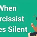 Person sitting alone looking confused while phone shows no messages, representing when narcissist goes silent treatment manipulation